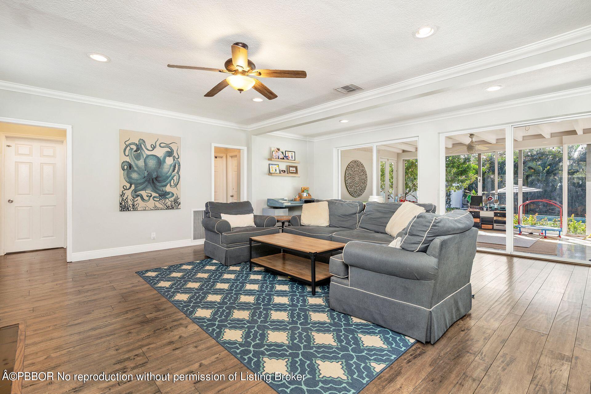 356 Potter Road West Palm Beach, FL 33405 - Photo 4 of 24 a living room with furniture and a large window