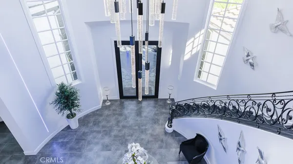 a view of a porch with furniture and front door