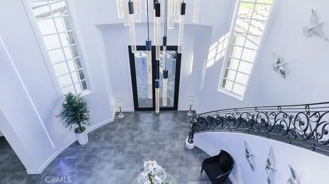 a view of a porch with furniture and front door