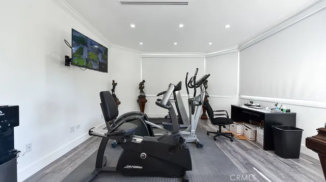 a view of a room with gym equipment