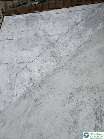 a view of road and car parked