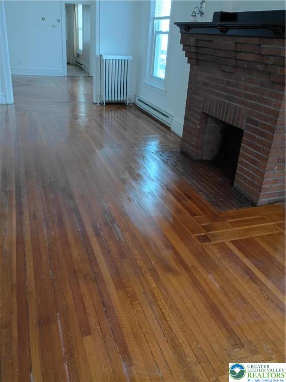 24 North 13th Street Allentown, PA 18102 - Photo 4 of 38 Faux Fireplace in Living Room with Beautiful Hardwood Floors