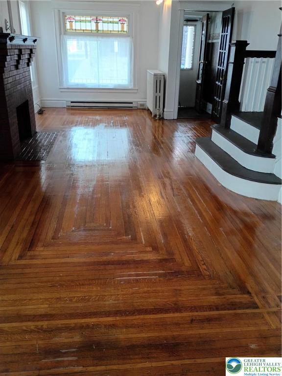24 North 13th Street Allentown, PA 18102 - Photo 5 of 38 Living Room with Living Room with Stained Glass Window