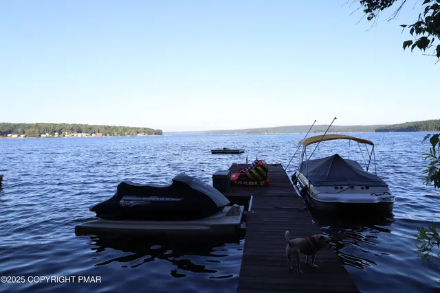 a view of a golf course with chairs