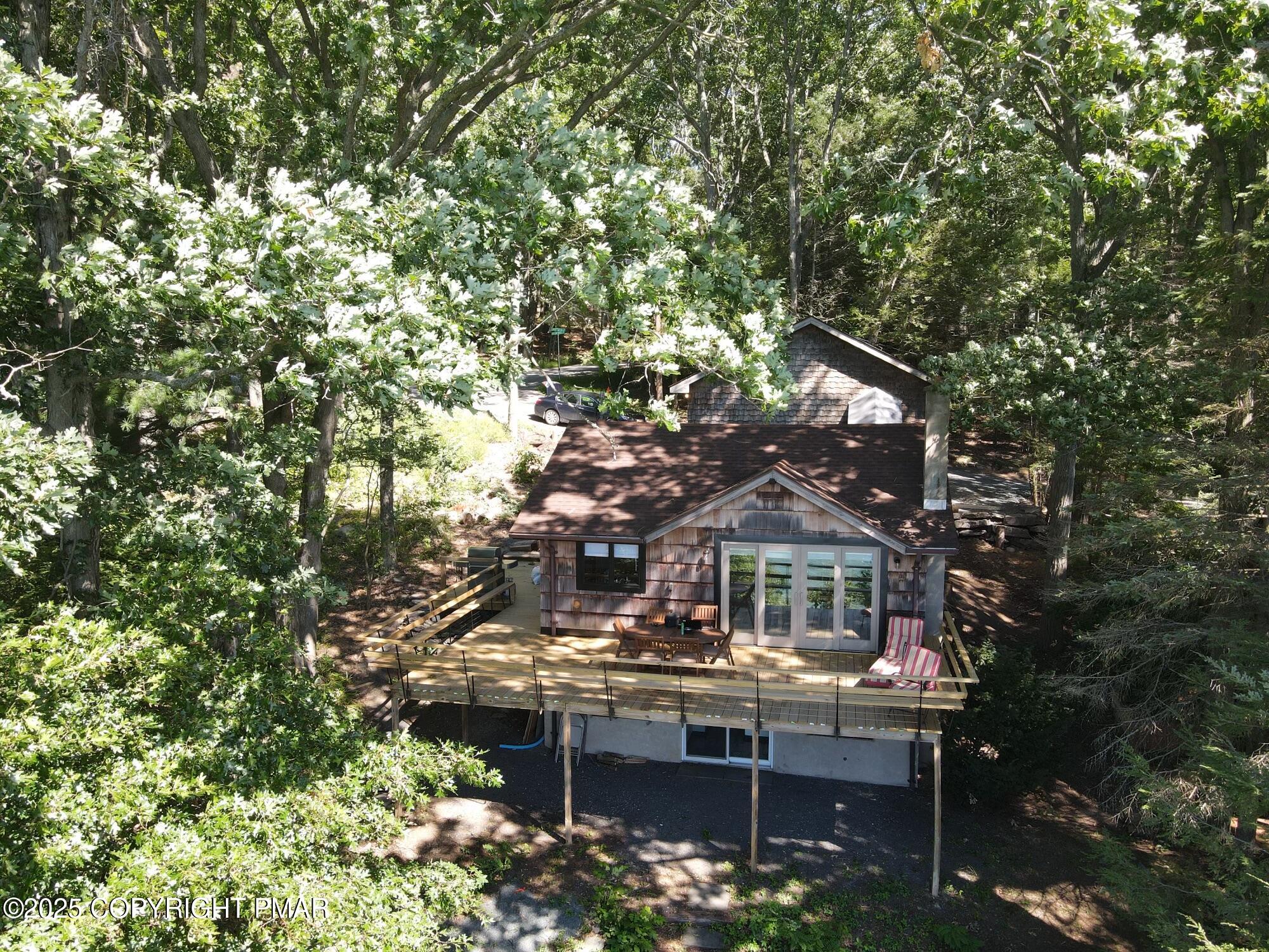 101 Antler Rdg Court Hawley, PA 18428 - Photo 2 of 36 a house view with a sitting space and garden space