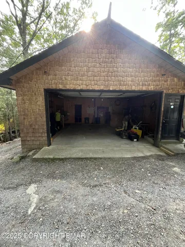 a view of a balcony with chairs