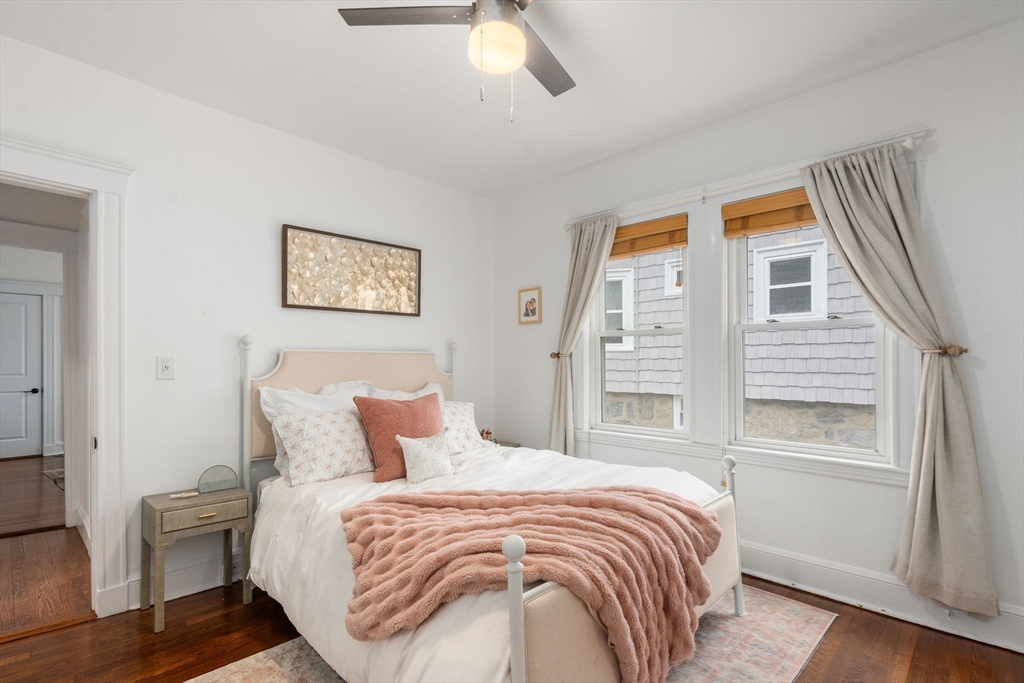 35-37 Presentation Road Boston, MA 02135 - Photo 11 of 29 a bedroom with a bed and a window