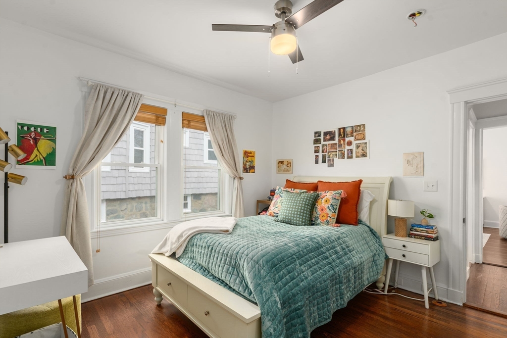 35-37 Presentation Road Boston, MA 02135 - Photo 12 of 29 a bedroom with a large bed and a window