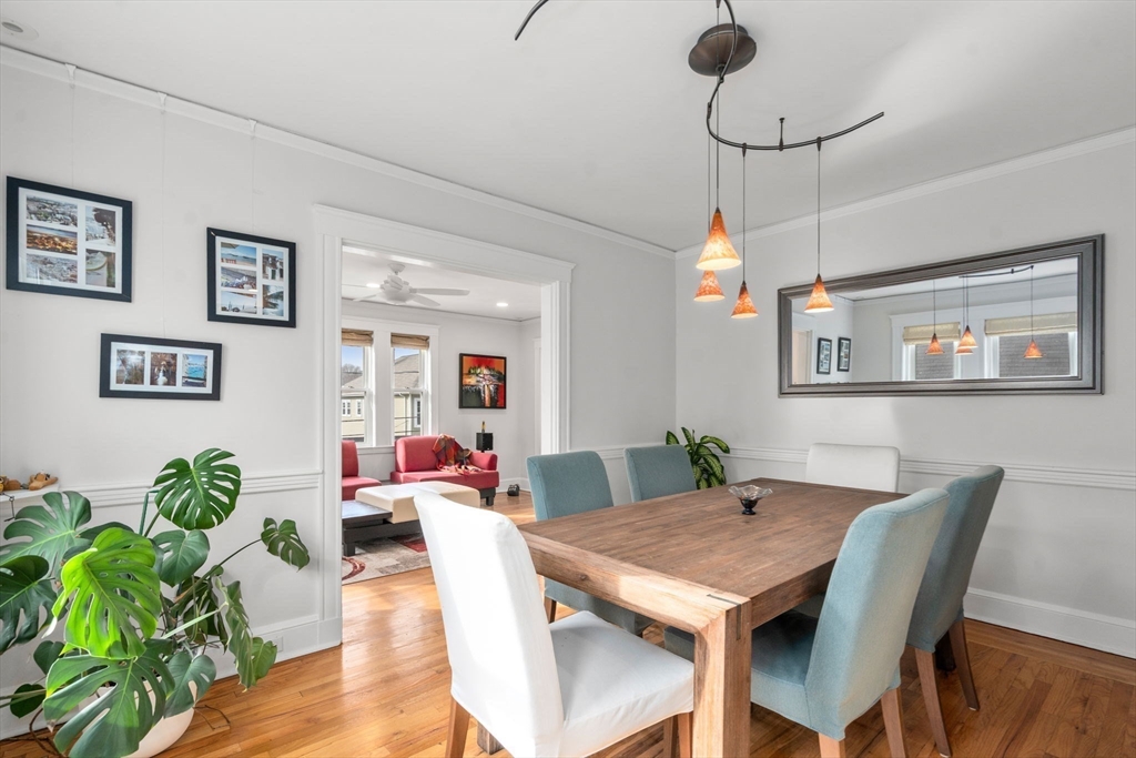 35-37 Presentation Road Boston, MA 02135 - Photo 16 of 29 a view of a dining room with furniture window and wooden floor