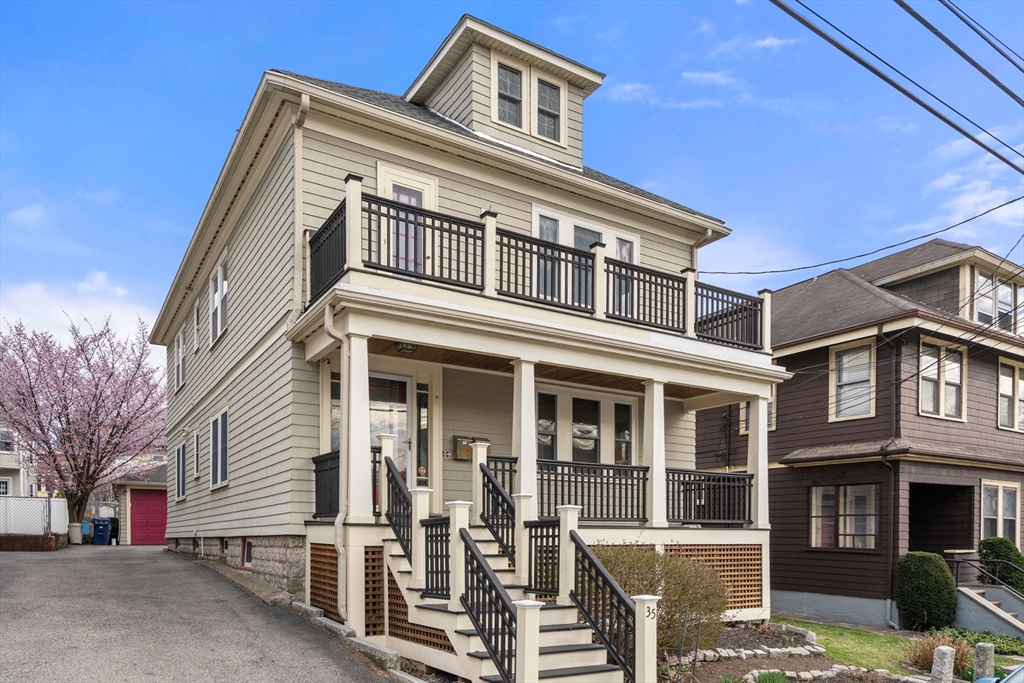 35-37 Presentation Road Boston, MA 02135 - Photo 2 of 29 a front view of a residential apartment building with a yard