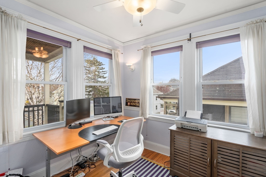35-37 Presentation Road Boston, MA 02135 - Photo 23 of 29 a view of a workspace with furniture and a window