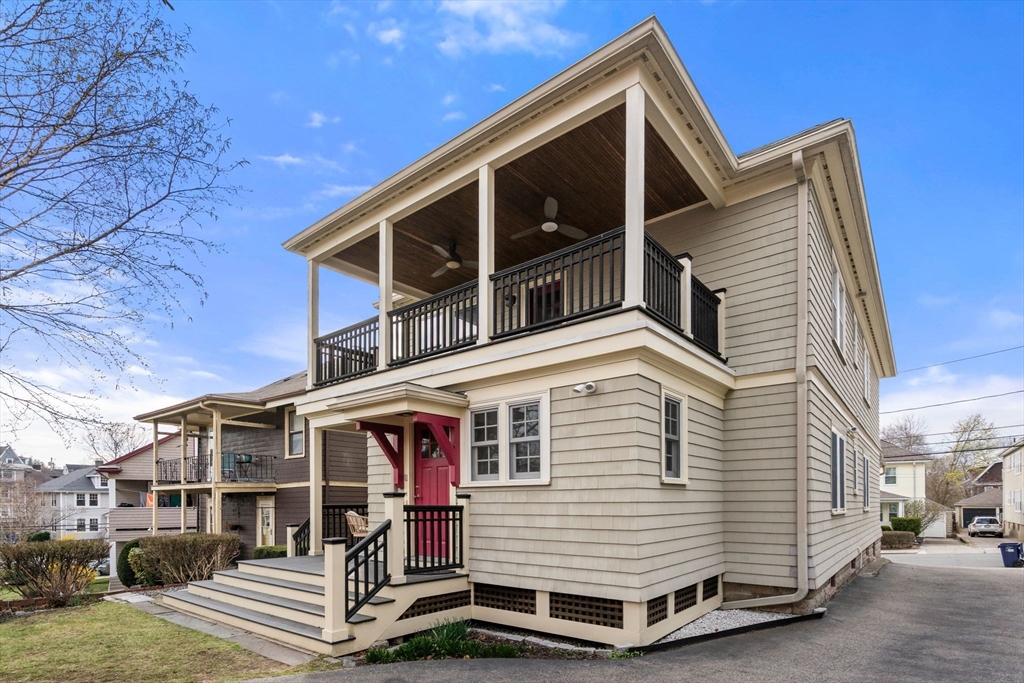 35-37 Presentation Road Boston, MA 02135 - Photo 26 of 29 a front view of a house with a yard