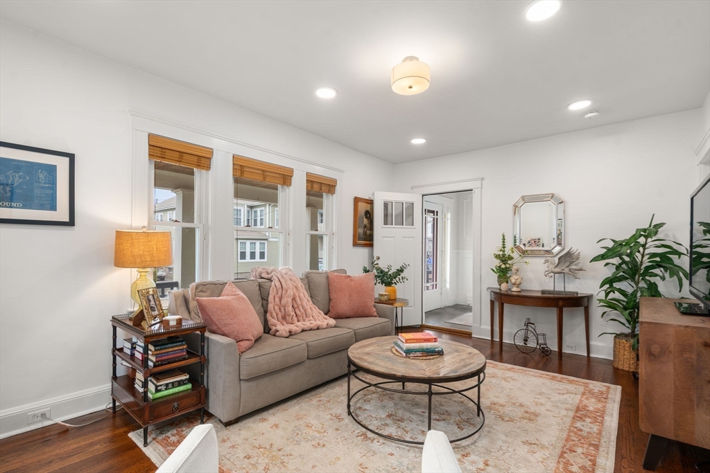 35-37 Presentation Road Boston, MA 02135 - Photo 3 of 29 a living room with furniture and a potted plant