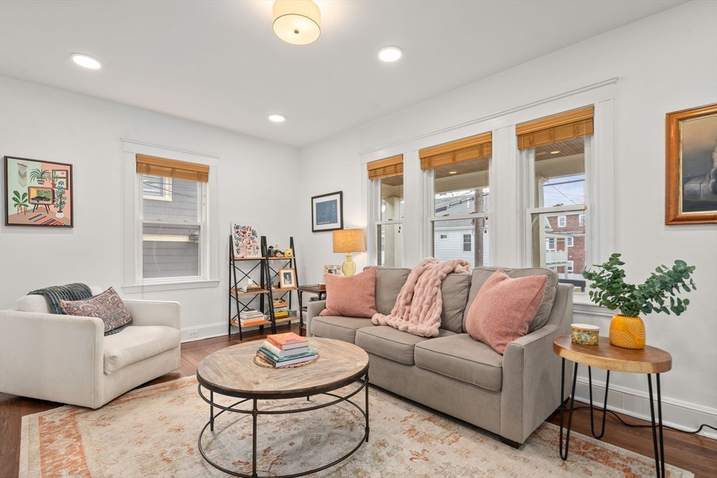 35-37 Presentation Road Boston, MA 02135 - Photo 4 of 29 a living room with furniture and a potted plant
