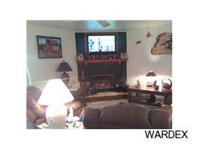 149807 Modoc Way Big River, CA 92242 - Photo 2 of 4 a black and white photo of a living room
