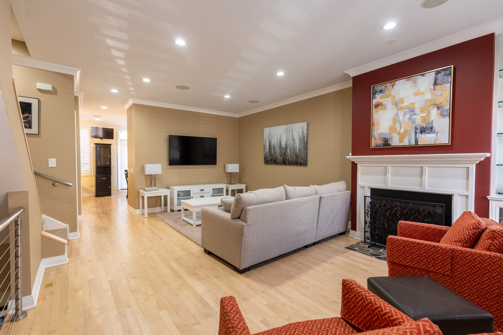 1125 West Monroe Street Chicago, IL 60607 - Photo 12 of 49 a living room with furniture a flat screen tv and a fireplace