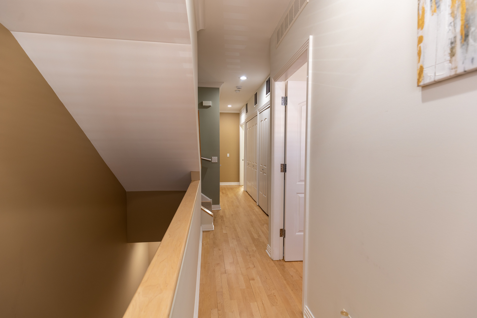 1125 West Monroe Street Chicago, IL 60607 - Photo 42 of 49 a view of a hallway with wooden floor and staircase