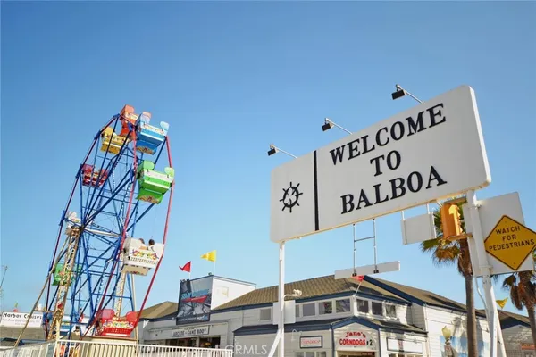 a front view of a building with sign board