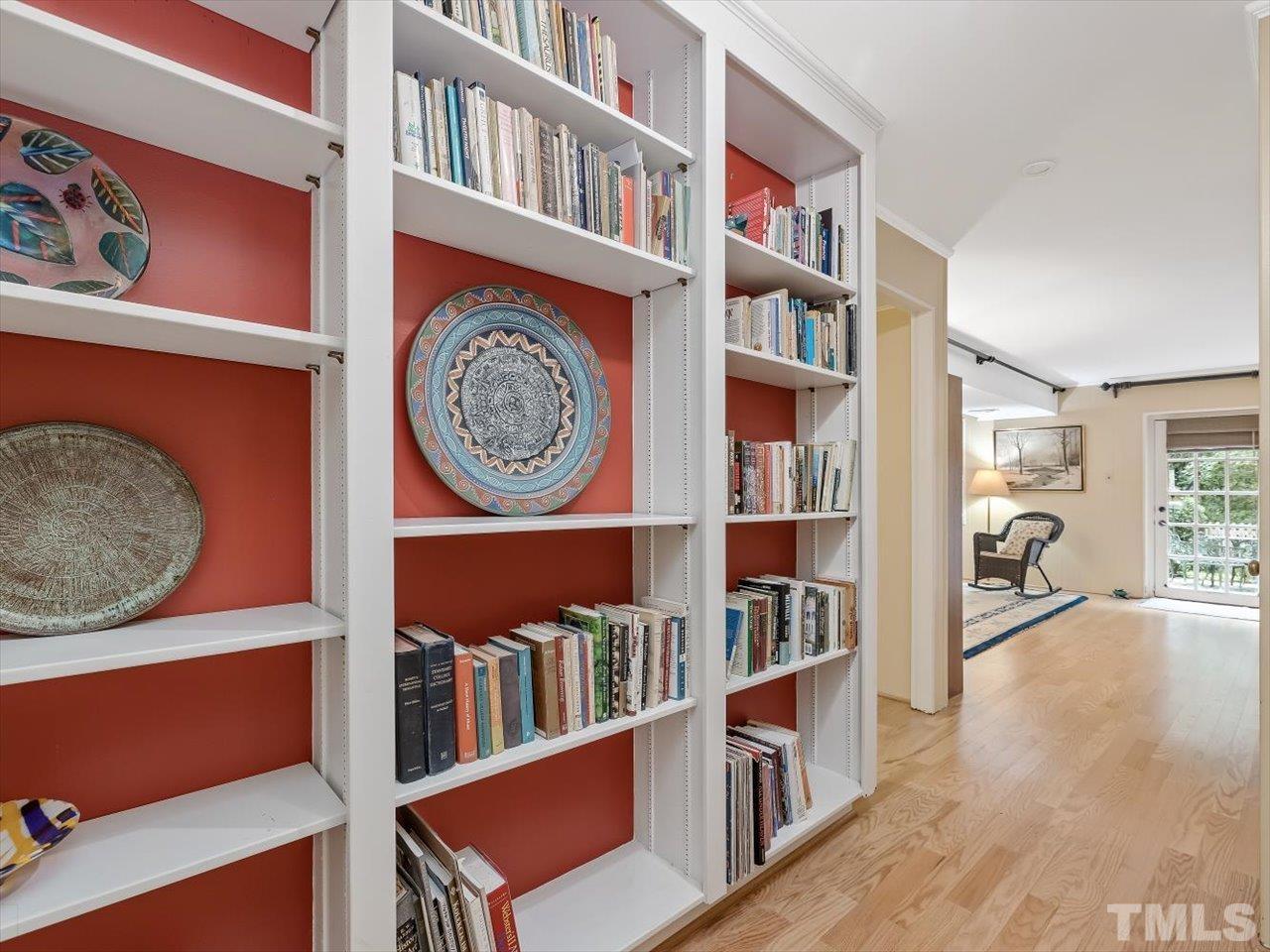 2868 Wycliff Road Raleigh, NC 27607 - Photo 18 of 28 a view of a book shelf with a book shelf
