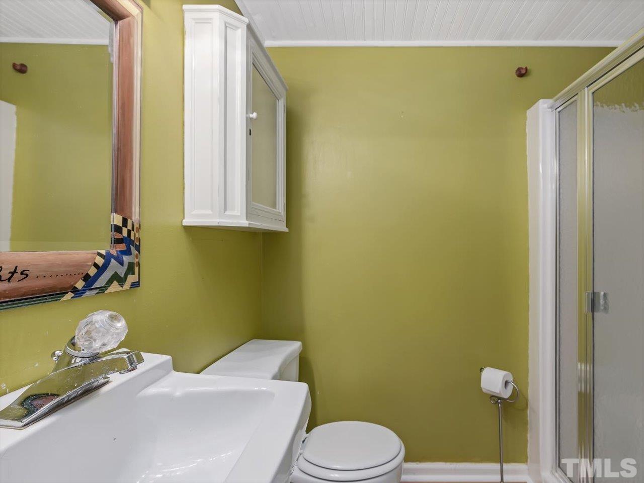 2868 Wycliff Road Raleigh, NC 27607 - Photo 22 of 28 a bathroom with a sink toilet and shower