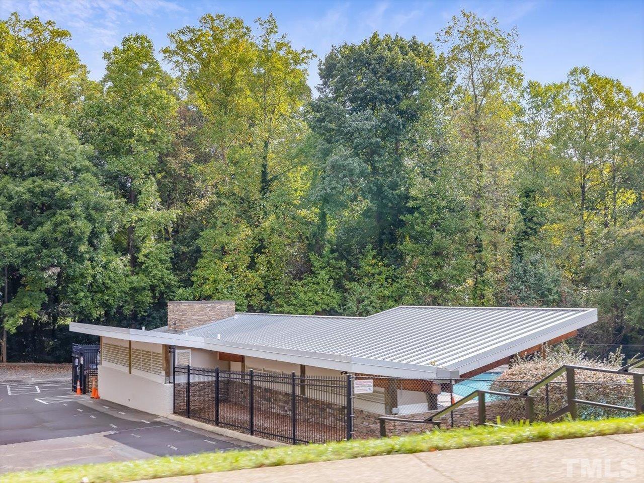 2868 Wycliff Road Raleigh, NC 27607 - Photo 26 of 28 a view of a house with backyard and sitting area