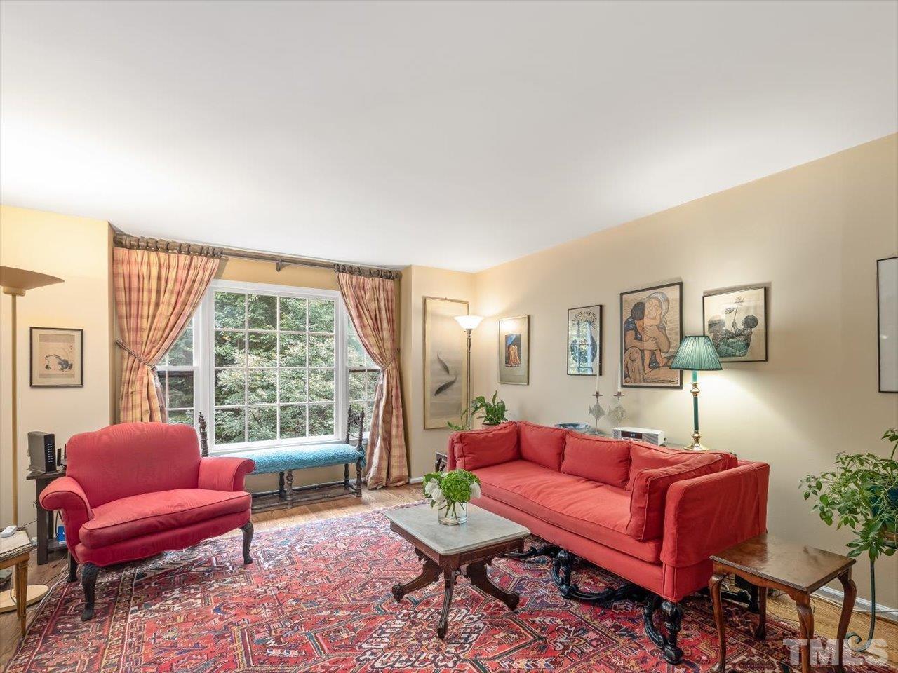 2868 Wycliff Road Raleigh, NC 27607 - Photo 5 of 28 a living room with furniture and a large window