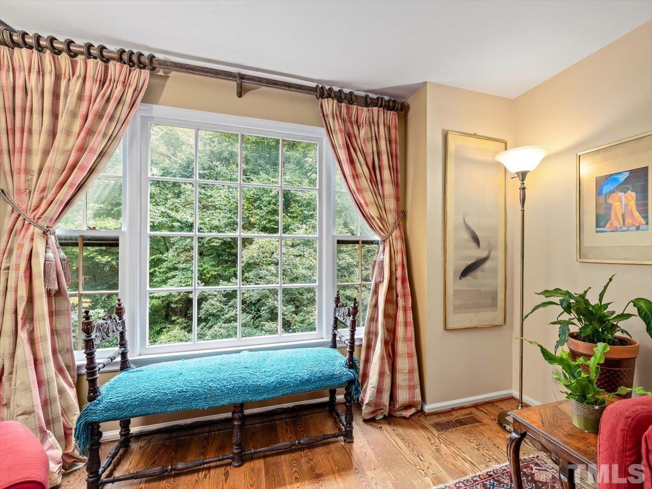 2868 Wycliff Road Raleigh, NC 27607 - Photo 7 of 28 a bedroom with furniture and a window