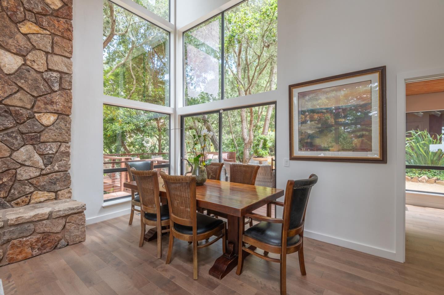 29705 Peter Pan Road Carmel, CA 93923 - Photo 13 of 51 a view of a dining room with furniture window and wooden floor