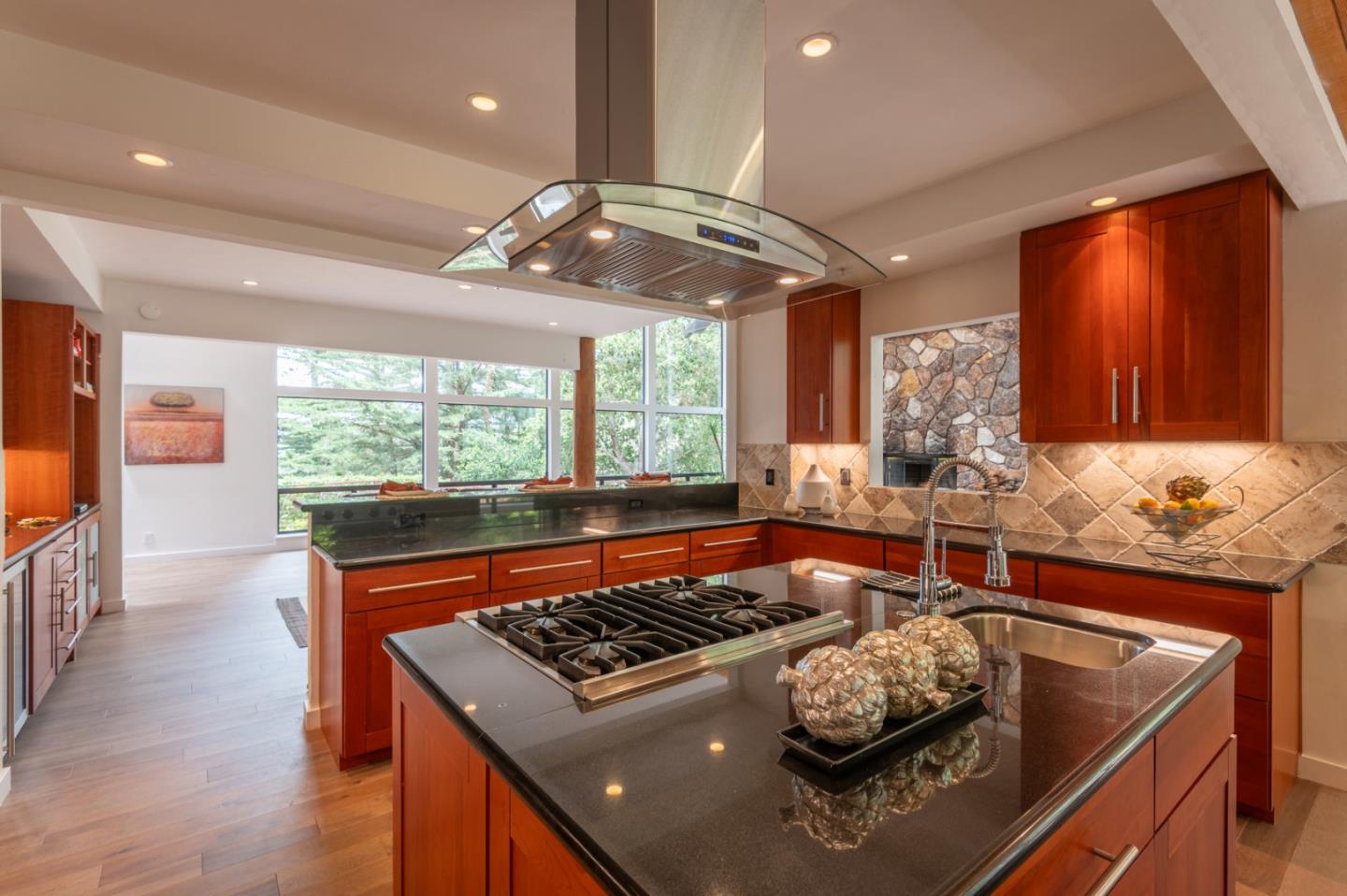 29705 Peter Pan Road Carmel, CA 93923 - Photo 15 of 51 a kitchen with stainless steel appliances granite countertop a stove and a sink