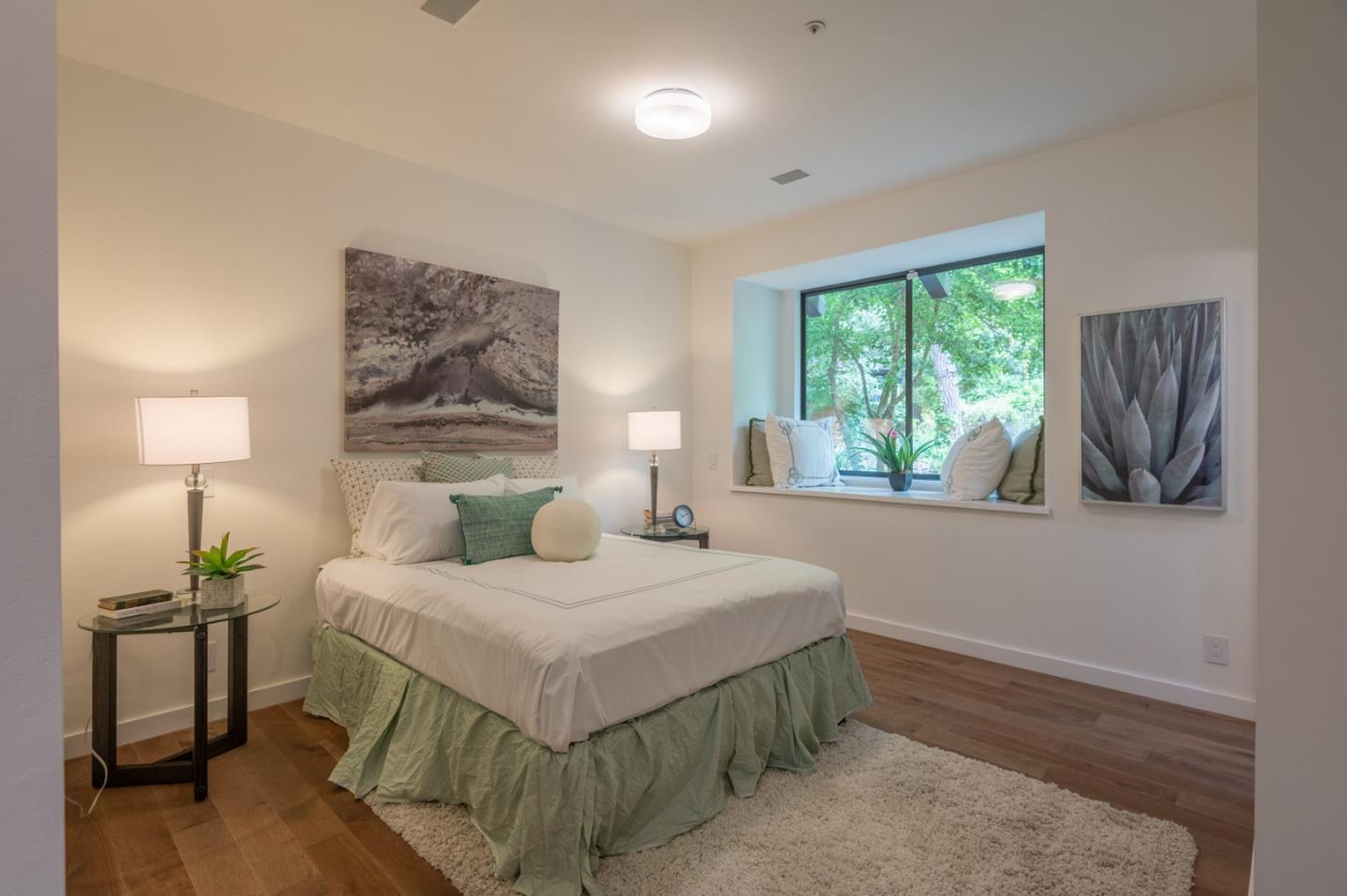 29705 Peter Pan Road Carmel, CA 93923 - Photo 22 of 51 a bedroom with a bed and a window