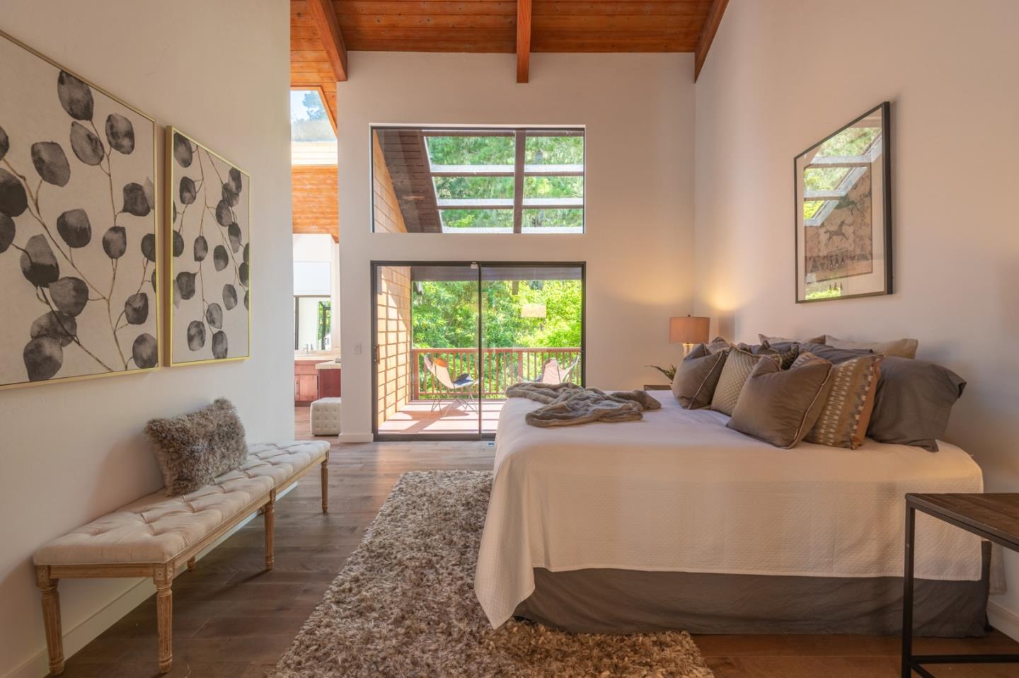 29705 Peter Pan Road Carmel, CA 93923 - Photo 31 of 51 a bedroom with a bed and a couch