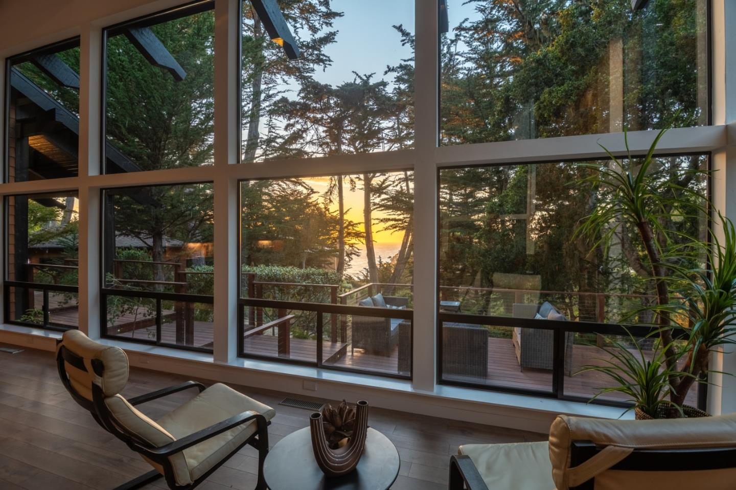 29705 Peter Pan Road Carmel, CA 93923 - Photo 36 of 51 a living room with hardwood floor and a floor to ceiling window