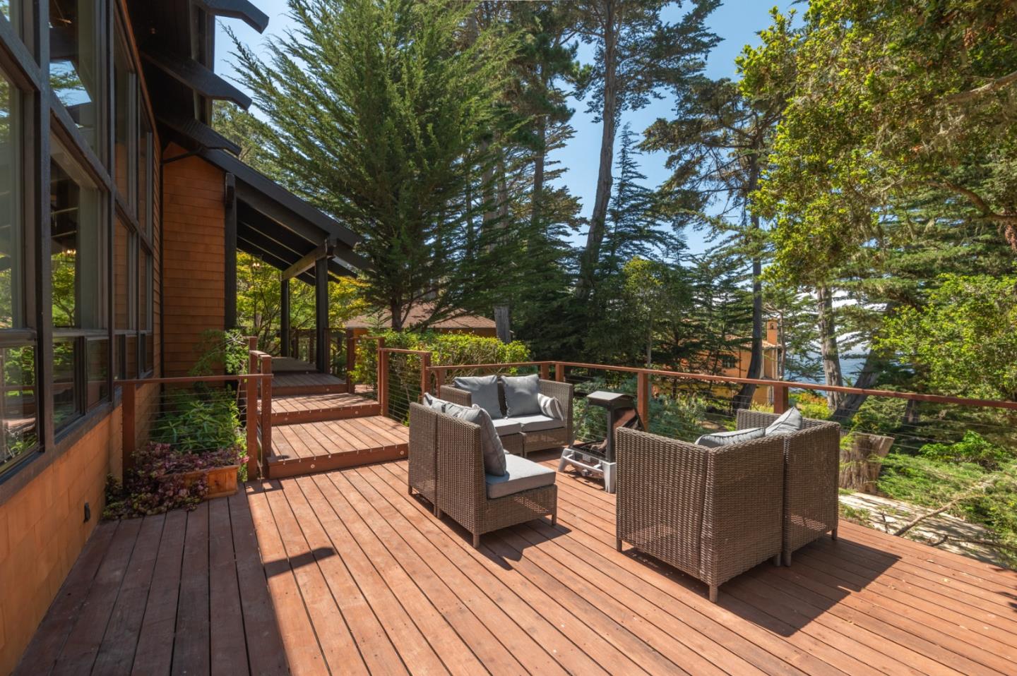 29705 Peter Pan Road Carmel, CA 93923 - Photo 38 of 51 a view of a roof deck with wooden floor and fence