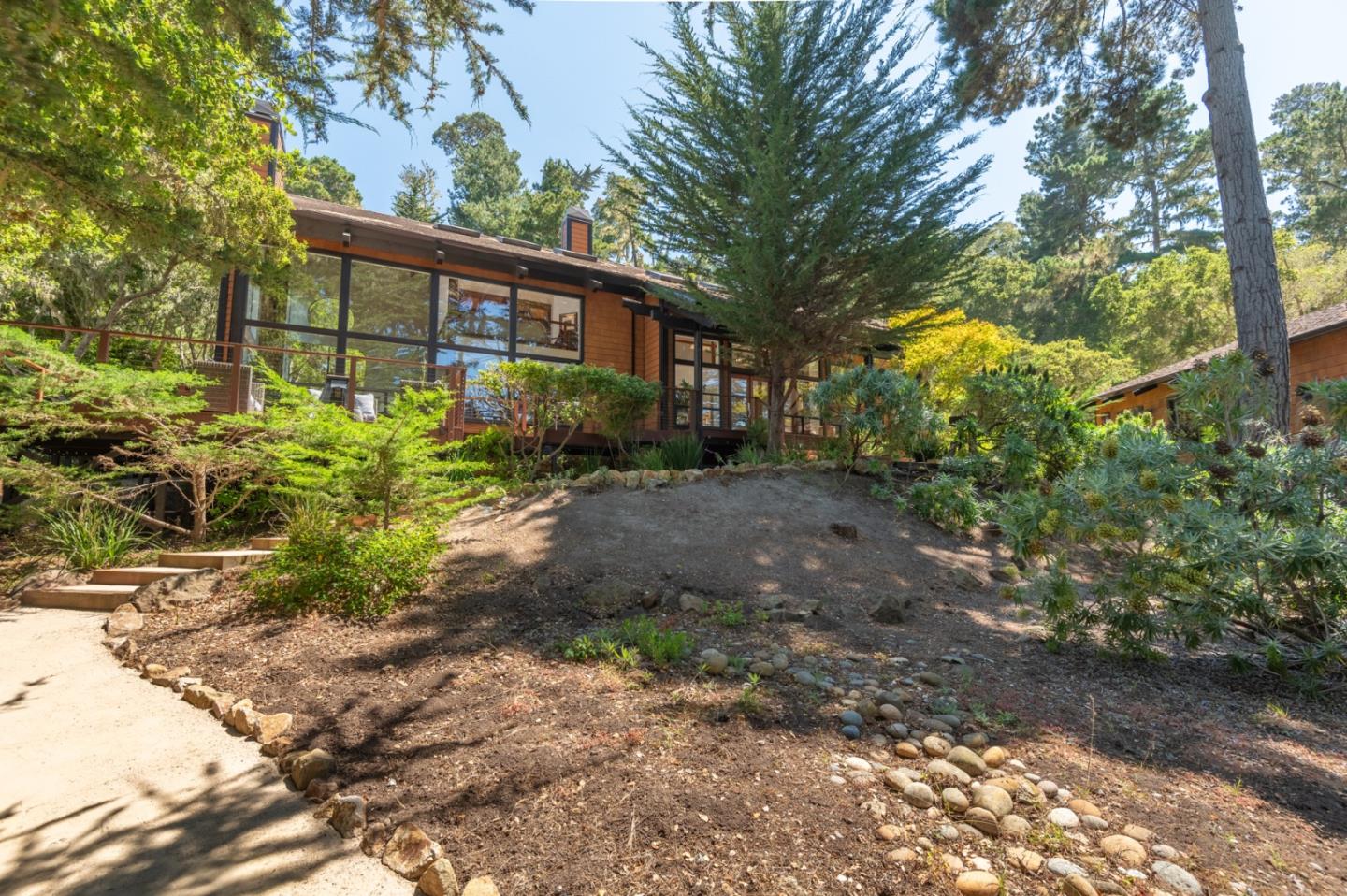 29705 Peter Pan Road Carmel, CA 93923 - Photo 40 of 51 a view of a house with a yard