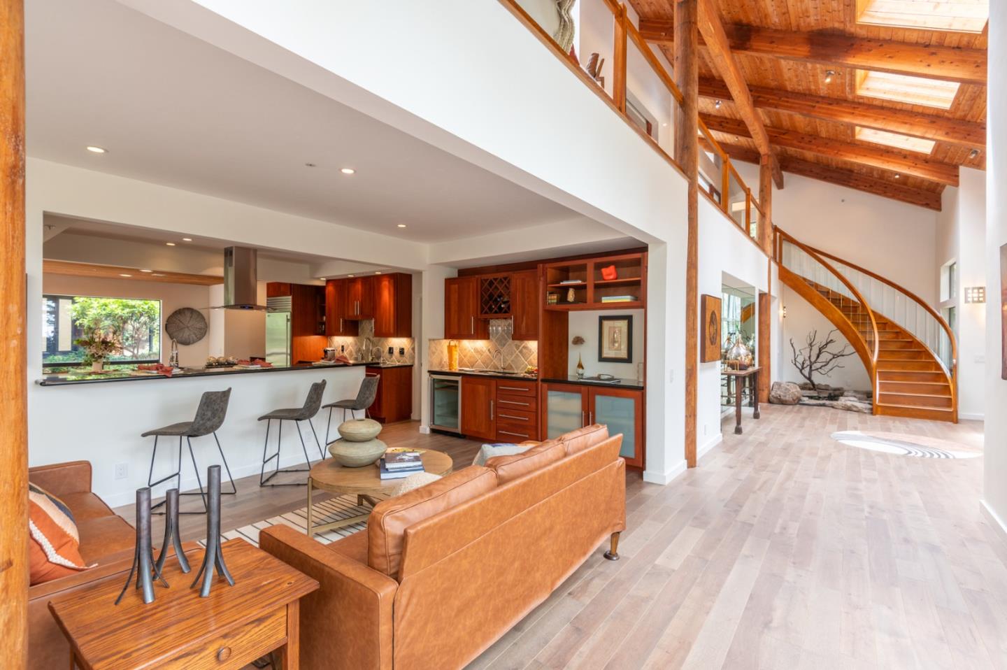 29705 Peter Pan Road Carmel, CA 93923 - Photo 6 of 51 a living room with lots of furniture and wooden floors