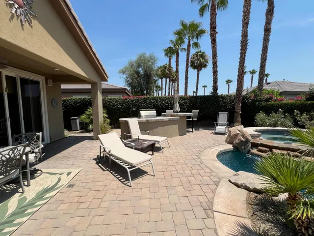 a outdoor space with lots of furniture and garden
