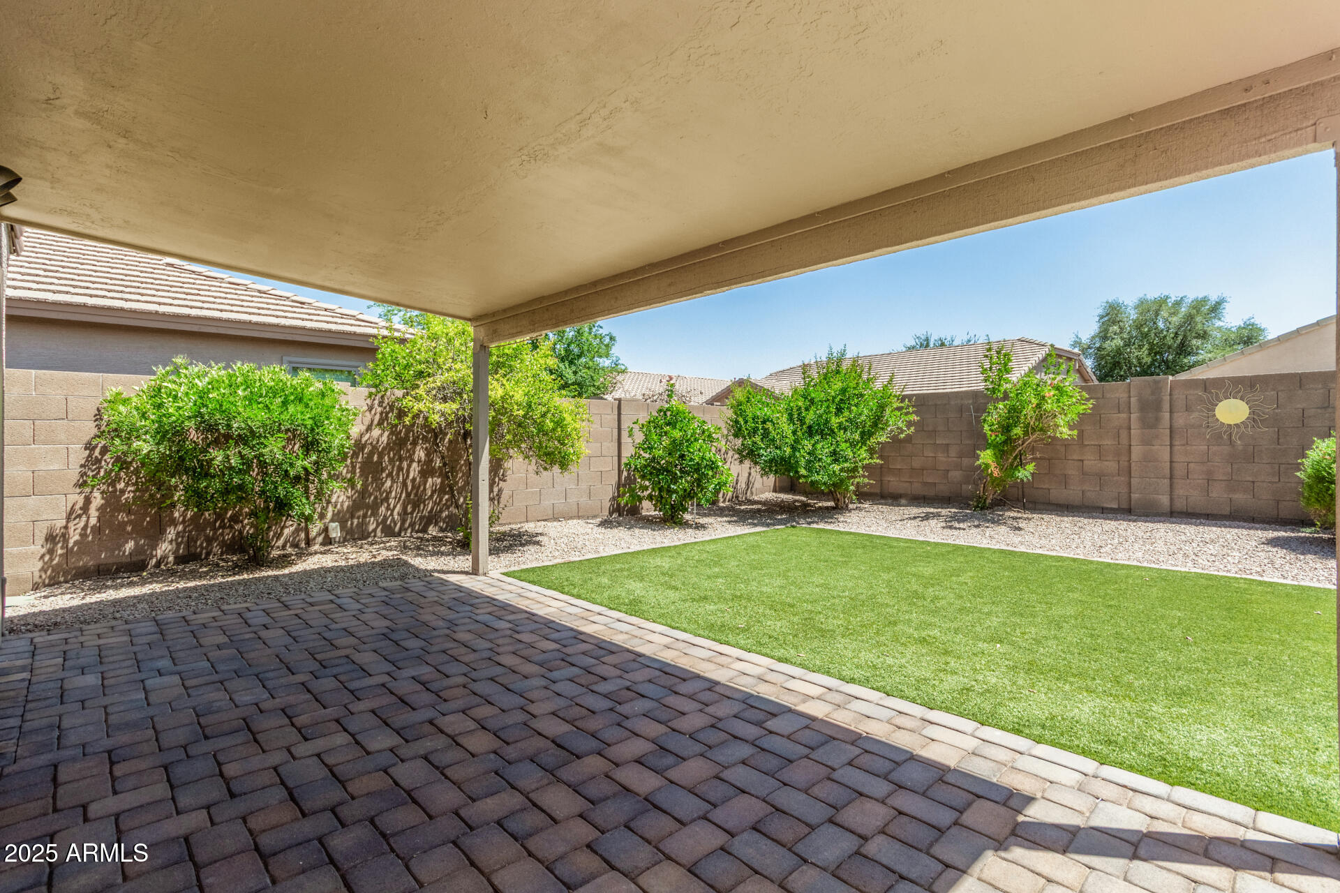 42505 West Venture Road Maricopa, AZ 85138 - Photo 11 of 11 a view of a backyard with plants and a garden