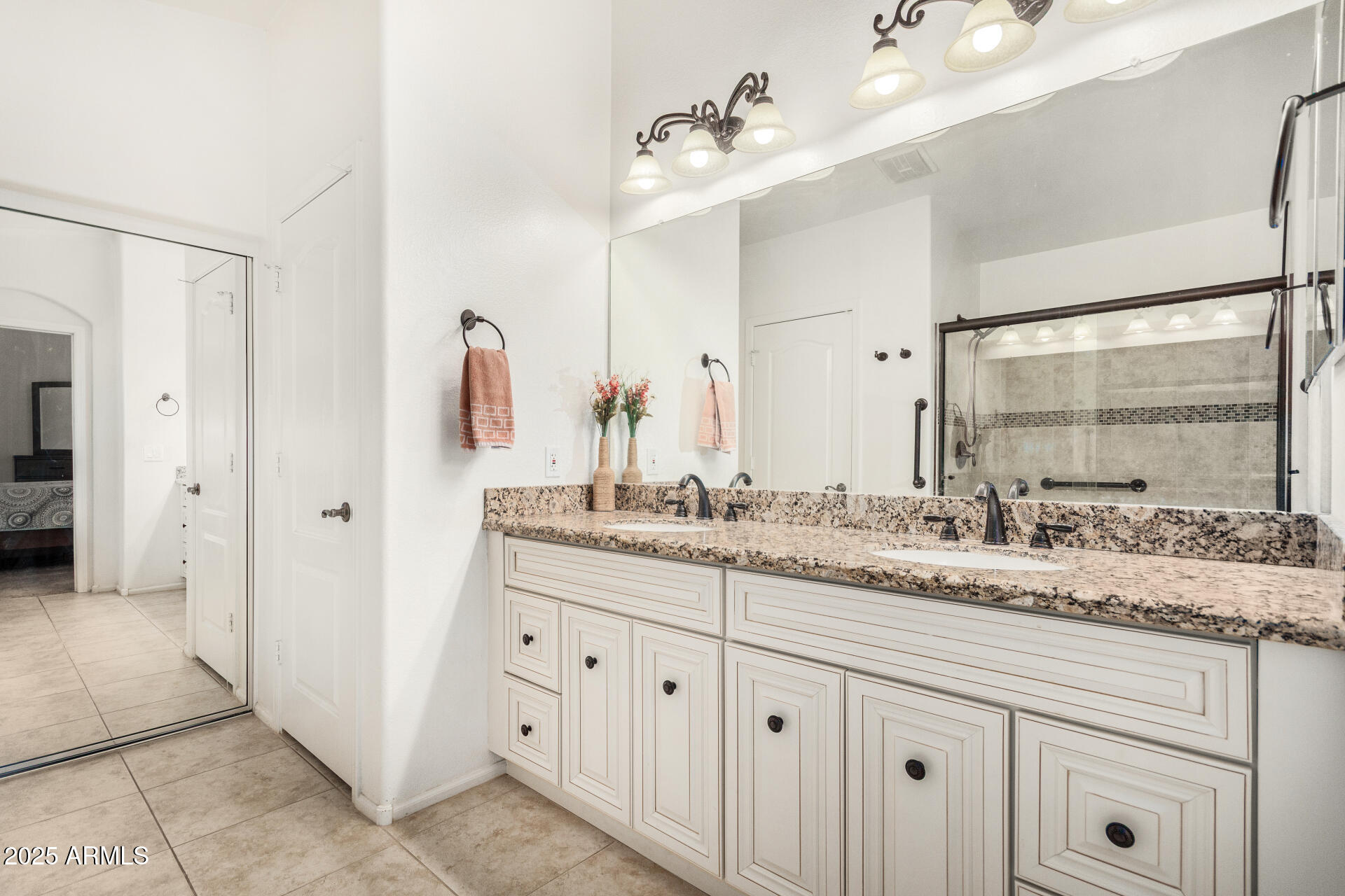 42505 West Venture Road Maricopa, AZ 85138 - Photo 7 of 11 a bathroom with a granite countertop sink and a mirror