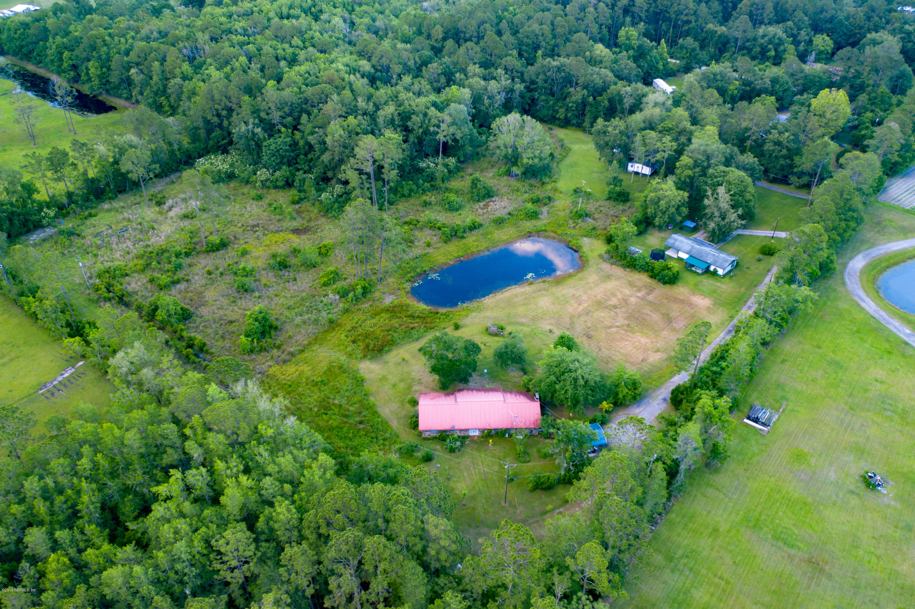 986 Bea Lane Jacksonville, FL 32220 - Photo 1 of 42 an aerial view of a yard