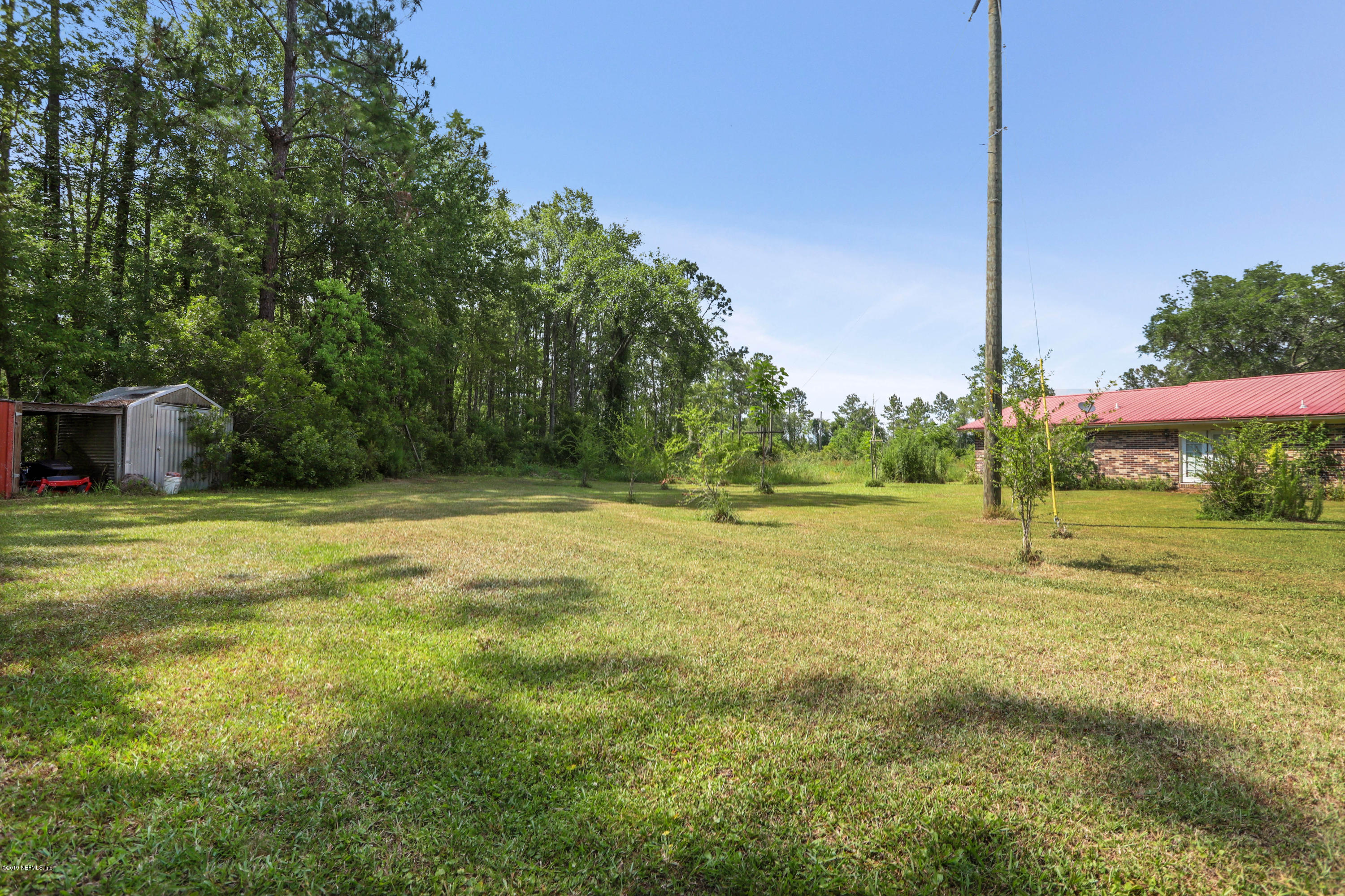 986 Bea Lane Jacksonville, FL 32220 - Photo 11 of 42 a swimming pool with outdoor space