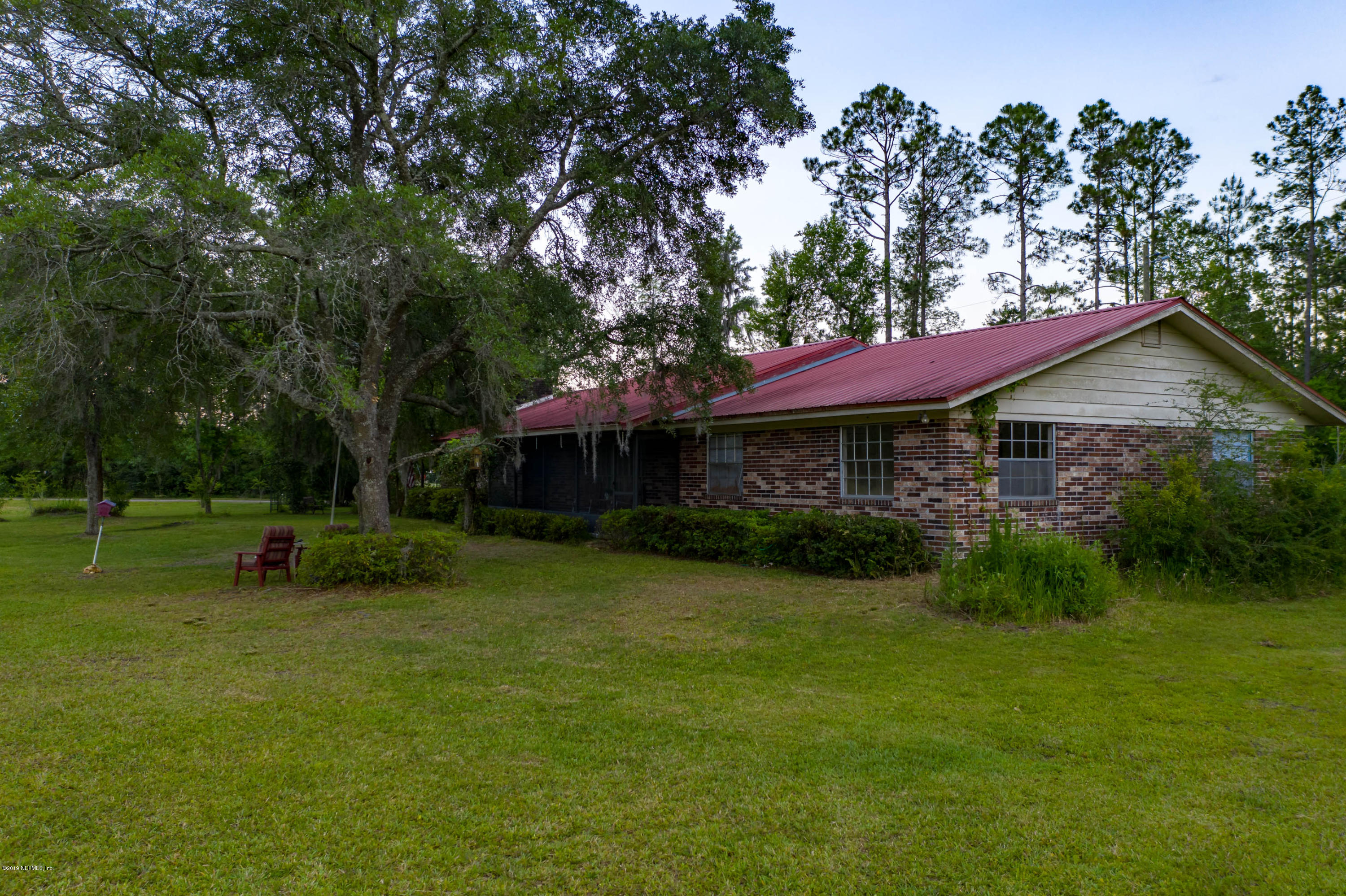 986 Bea Lane Jacksonville, FL 32220 - Photo 13 of 42 a view of a house with a yard