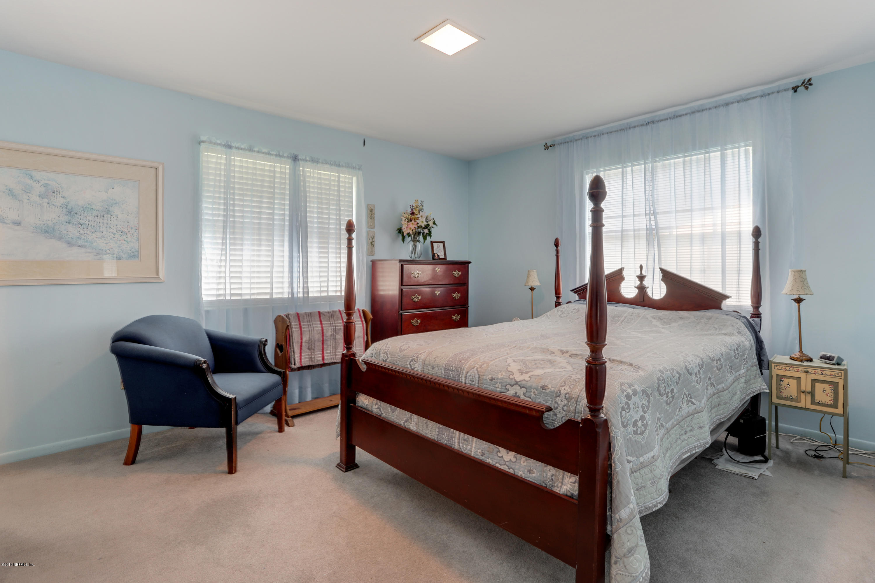 986 Bea Lane Jacksonville, FL 32220 - Photo 23 of 42 a bedroom with a bed and a window