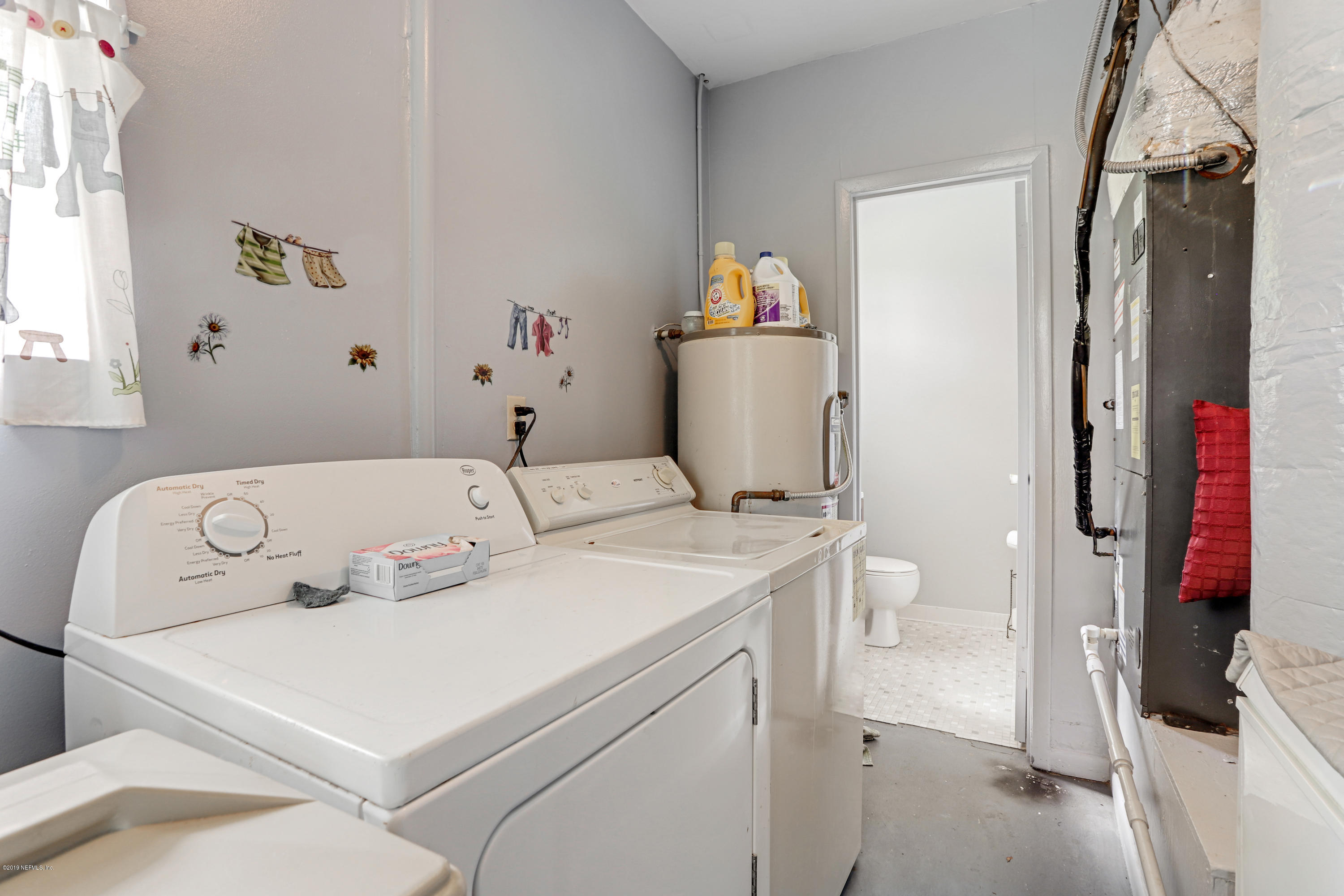 986 Bea Lane Jacksonville, FL 32220 - Photo 28 of 42 a utility room with dryer and washer