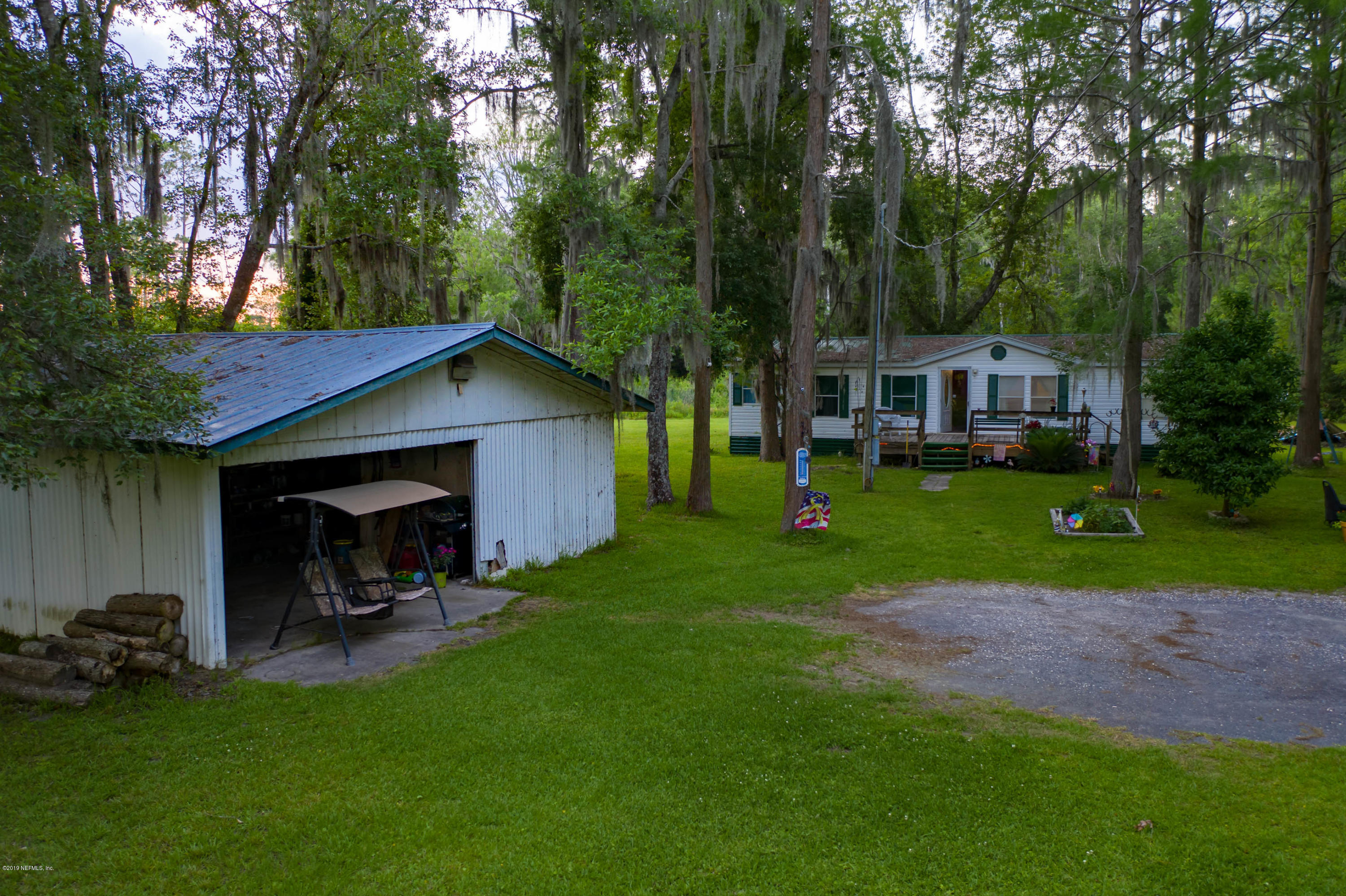 986 Bea Lane Jacksonville, FL 32220 - Photo 32 of 42 a view of outdoor space yard and patio