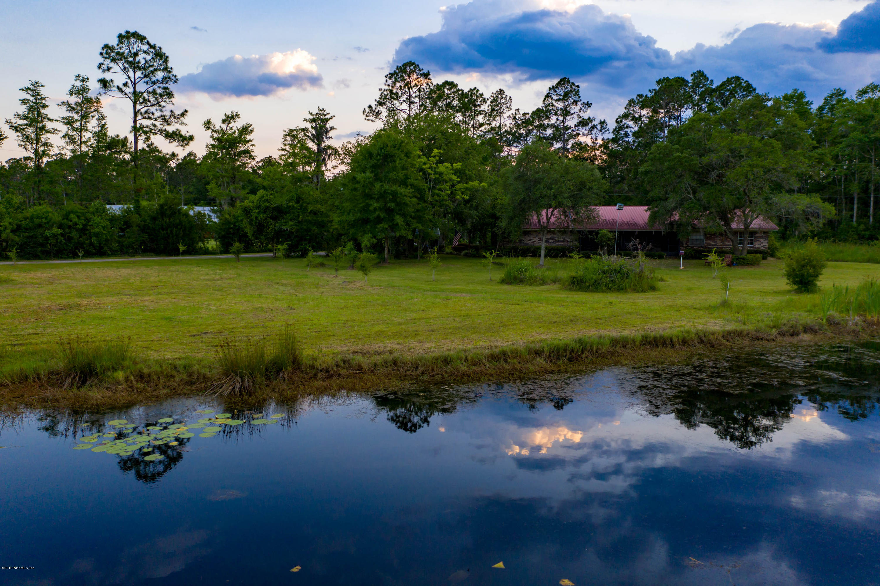 986 Bea Lane Jacksonville, FL 32220 - Photo 8 of 42 an aerial view of a house having yard