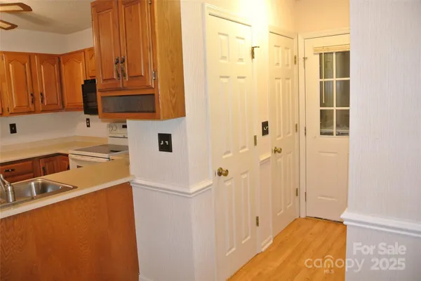 a bathroom with a sink a mirror and a shower