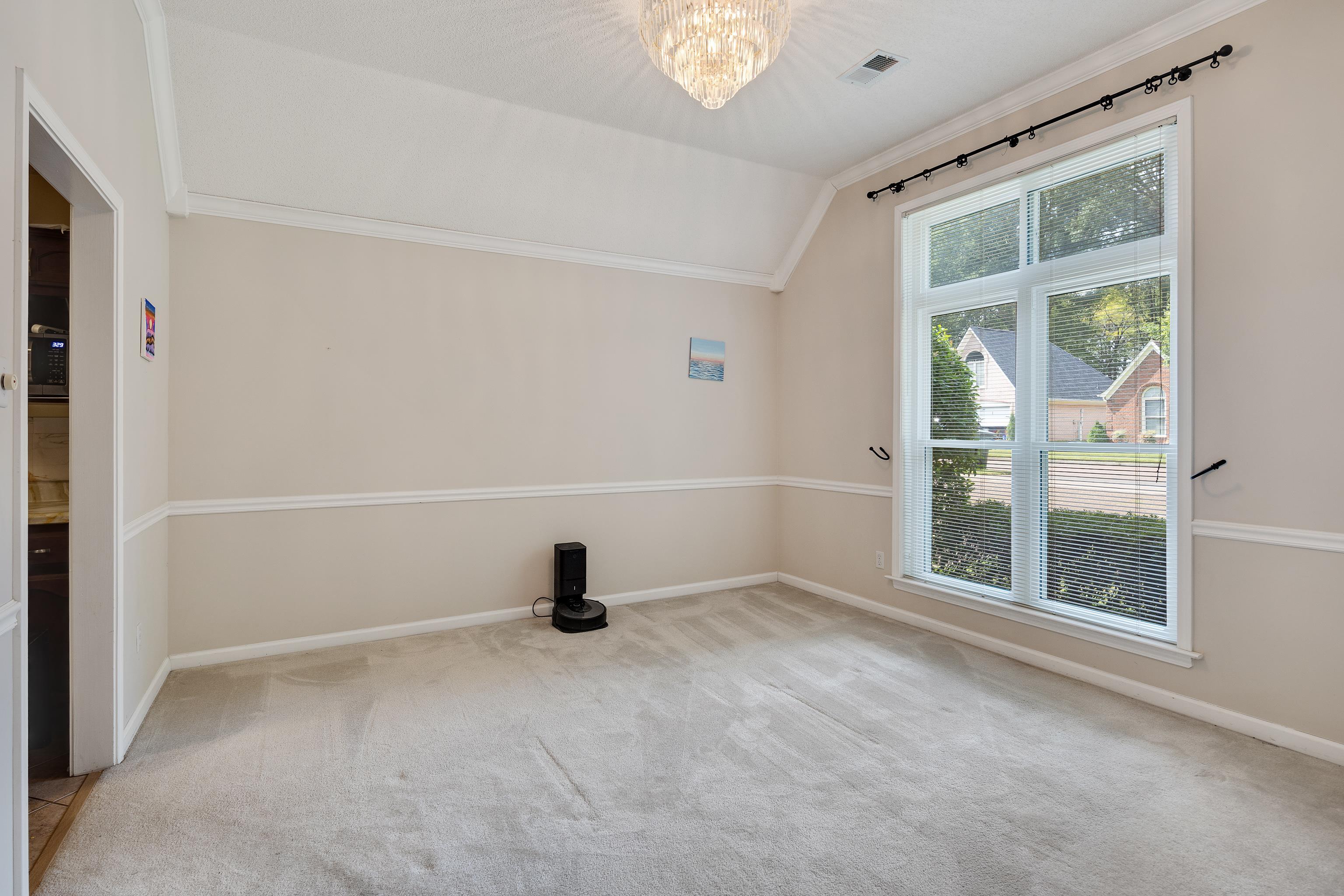 954 Wildbird Cove Collierville, TN 38017 - Photo 15 of 32 a view of an empty room with a window