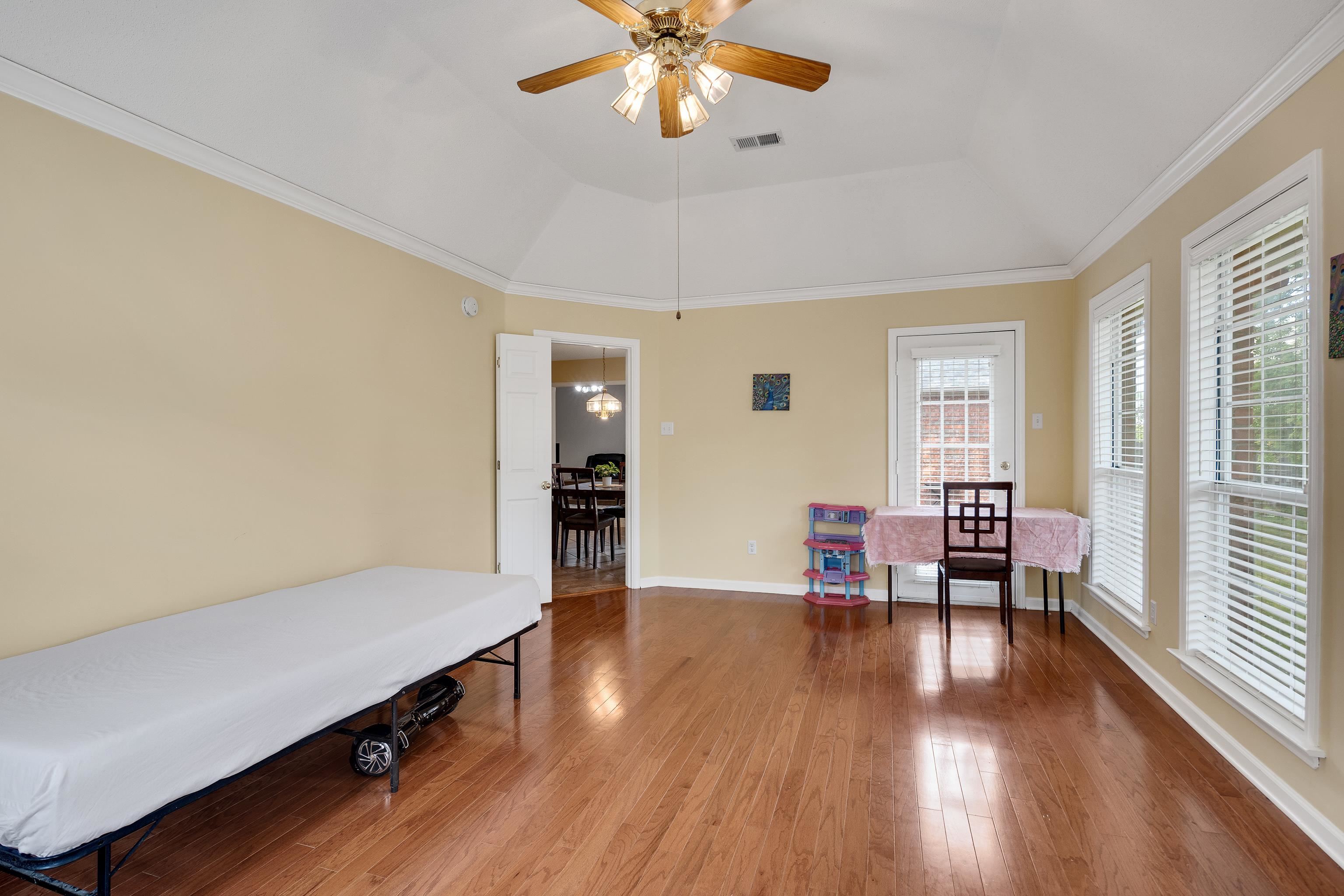 954 Wildbird Cove Collierville, TN 38017 - Photo 18 of 32 wooden floor with a window in a room