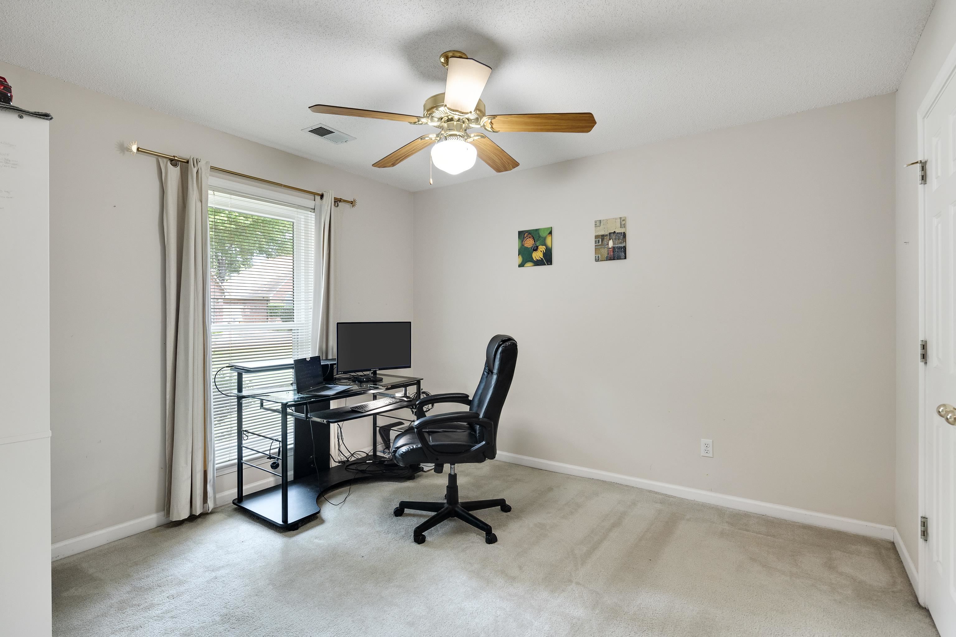 954 Wildbird Cove Collierville, TN 38017 - Photo 25 of 32 a view of a workspace with a window
