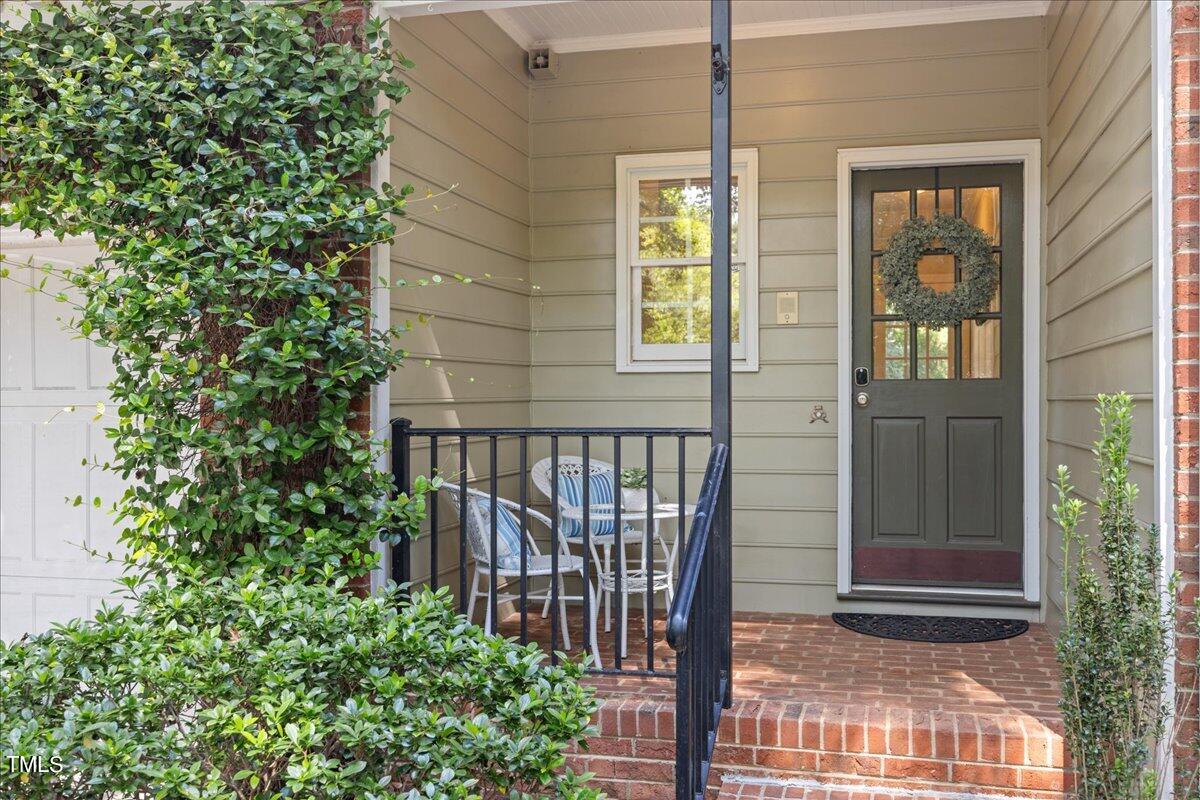 10036 Old Warden Road Raleigh, NC 27615 - Photo 3 of 42 a view of porch with a porch